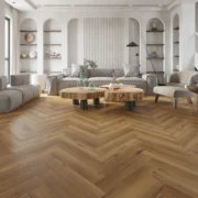 Natural oak herringbone wood floor in a contemporary wabi-sabi living space.